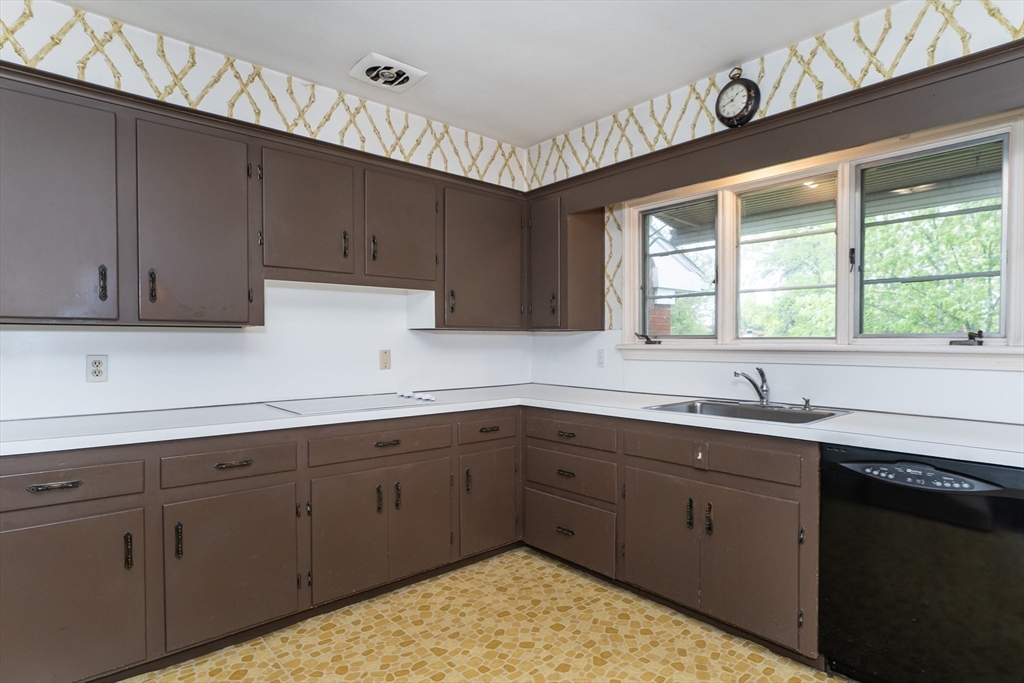 35 Squire Lane Springfield, MA 01118 - Photo 12 of 28 a kitchen with sink and cabinets