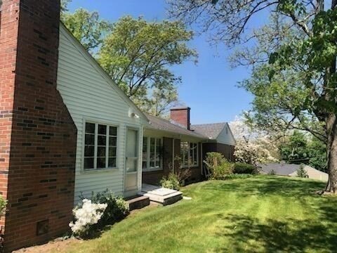 35 Squire Lane Springfield, MA 01118 - Photo 24 of 28 a view of a house with backyard tub and sitting area