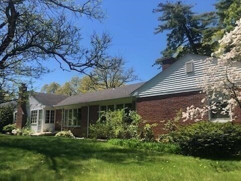 35 Squire Lane Springfield, MA 01118 - Photo 25 of 28 a front view of a house with a garden
