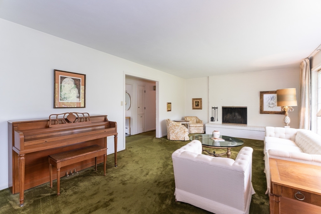 35 Squire Lane Springfield, MA 01118 - Photo 4 of 28 a living room with furniture and a piano