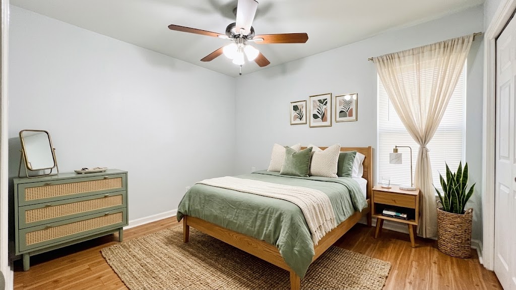 2301 Ohlen Road, Unit 109 Austin, TX 78757 - Photo 5 of 7 Smooth wood floors pair with clean lines in this serene, windowed sleeping space.