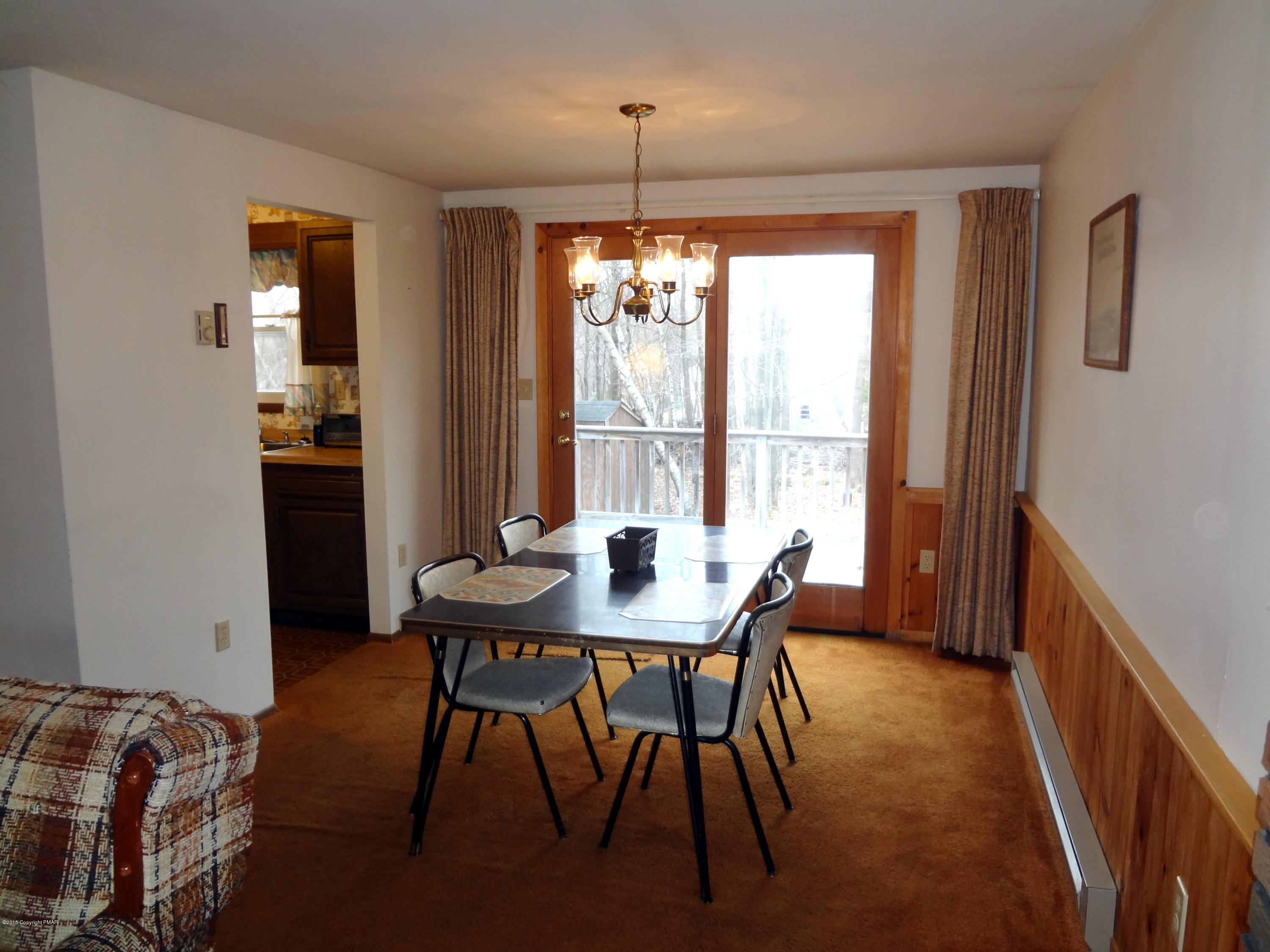 35 Shortridge Road Albrightsville, PA 18210 - Photo 16 of 27 a view of a dining room with furniture window and outside view