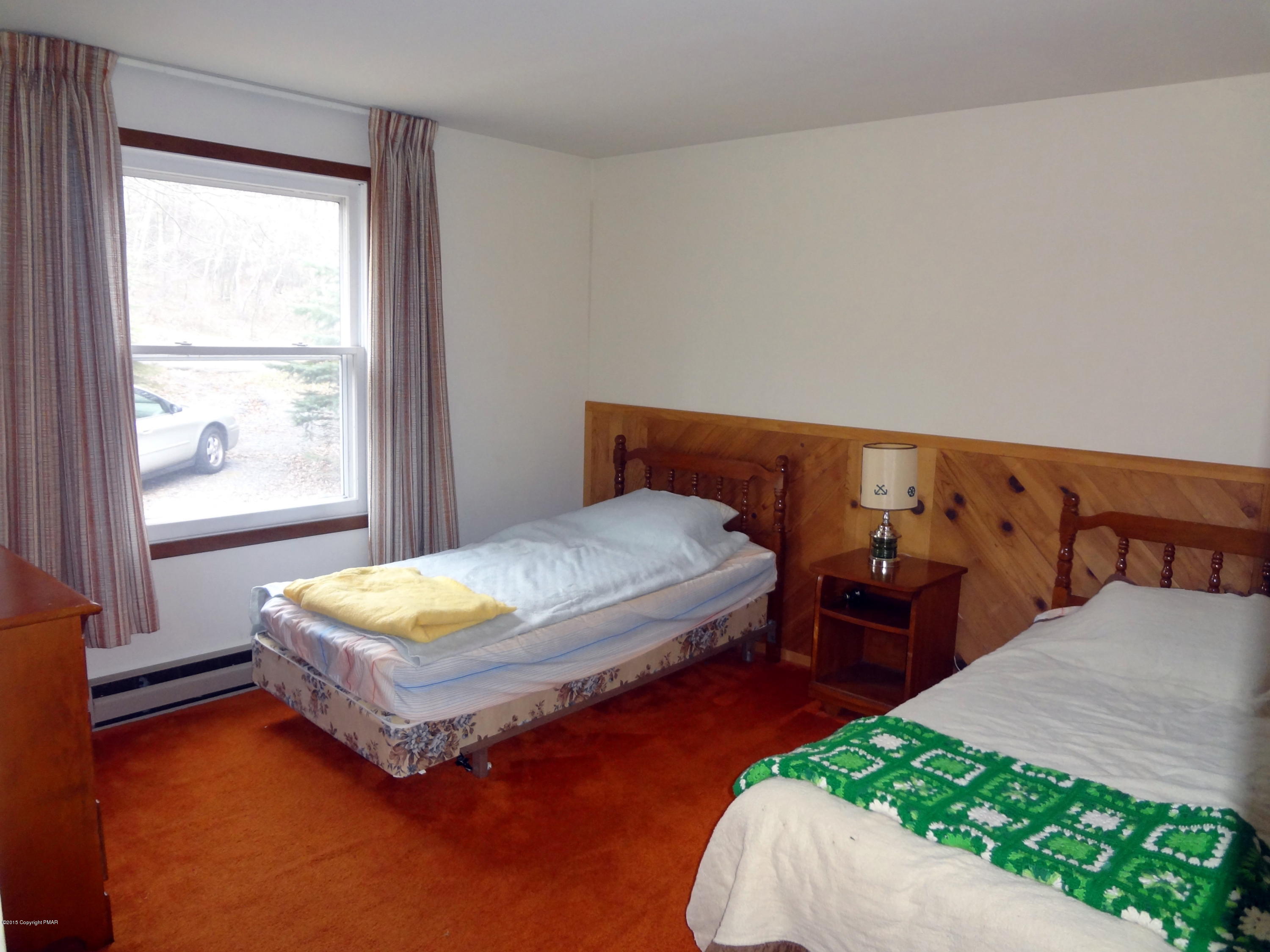 35 Shortridge Road Albrightsville, PA 18210 - Photo 21 of 27 a bedroom with two beds and next to a window