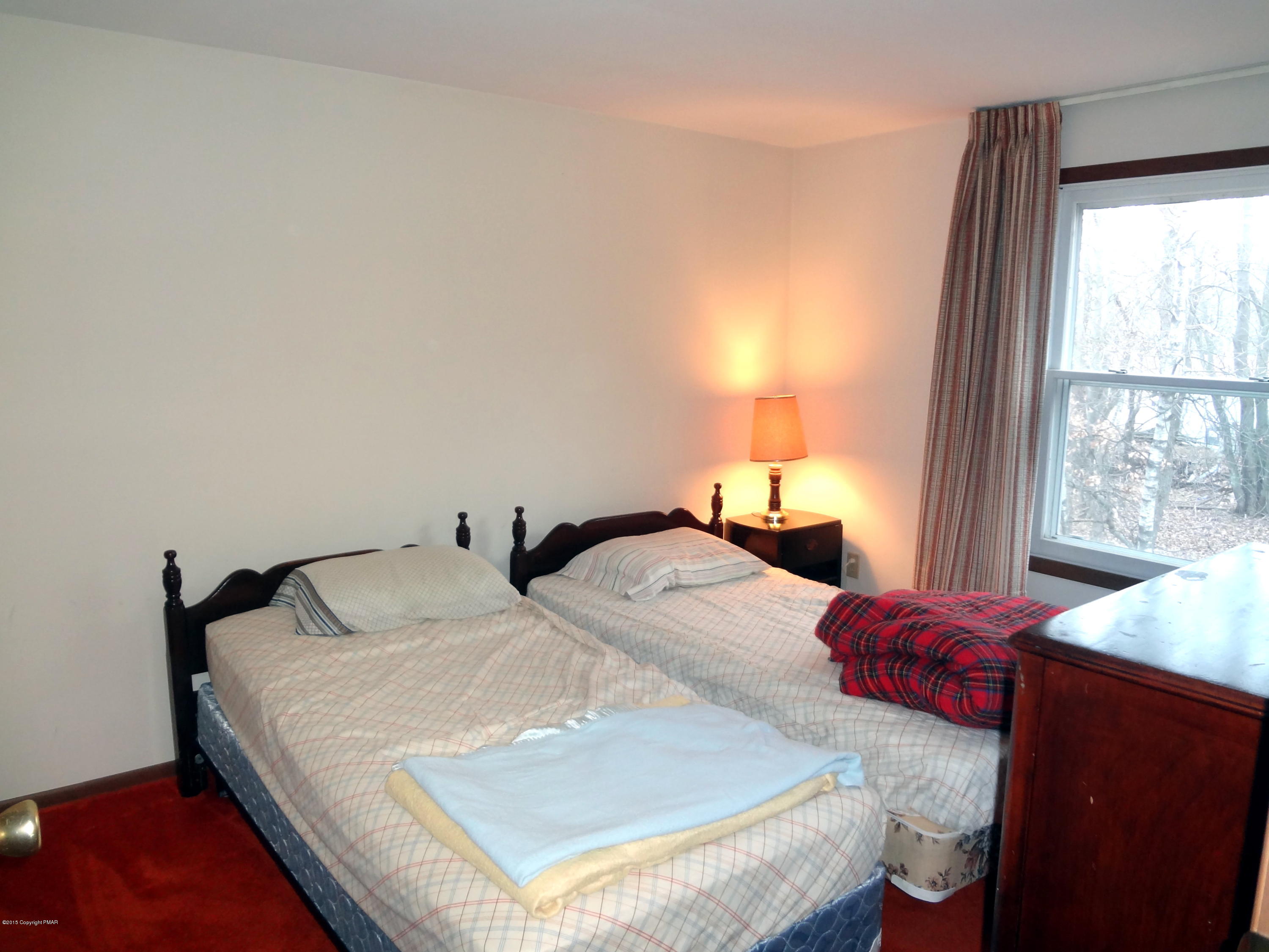 35 Shortridge Road Albrightsville, PA 18210 - Photo 23 of 27 a bedroom with a bed and window
