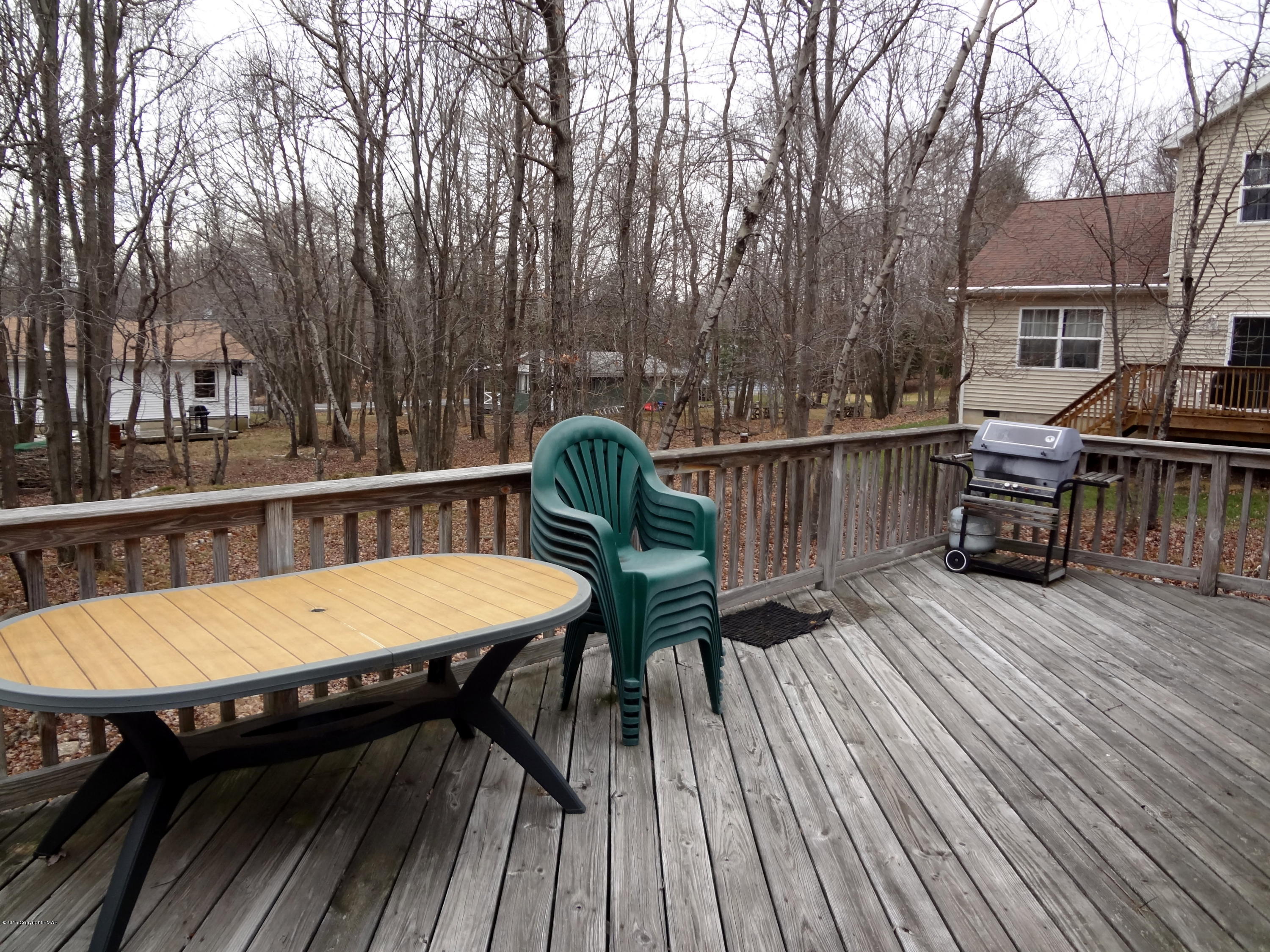 35 Shortridge Road Albrightsville, PA 18210 - Photo 4 of 27 a view of a chairs and table on the wooden floor