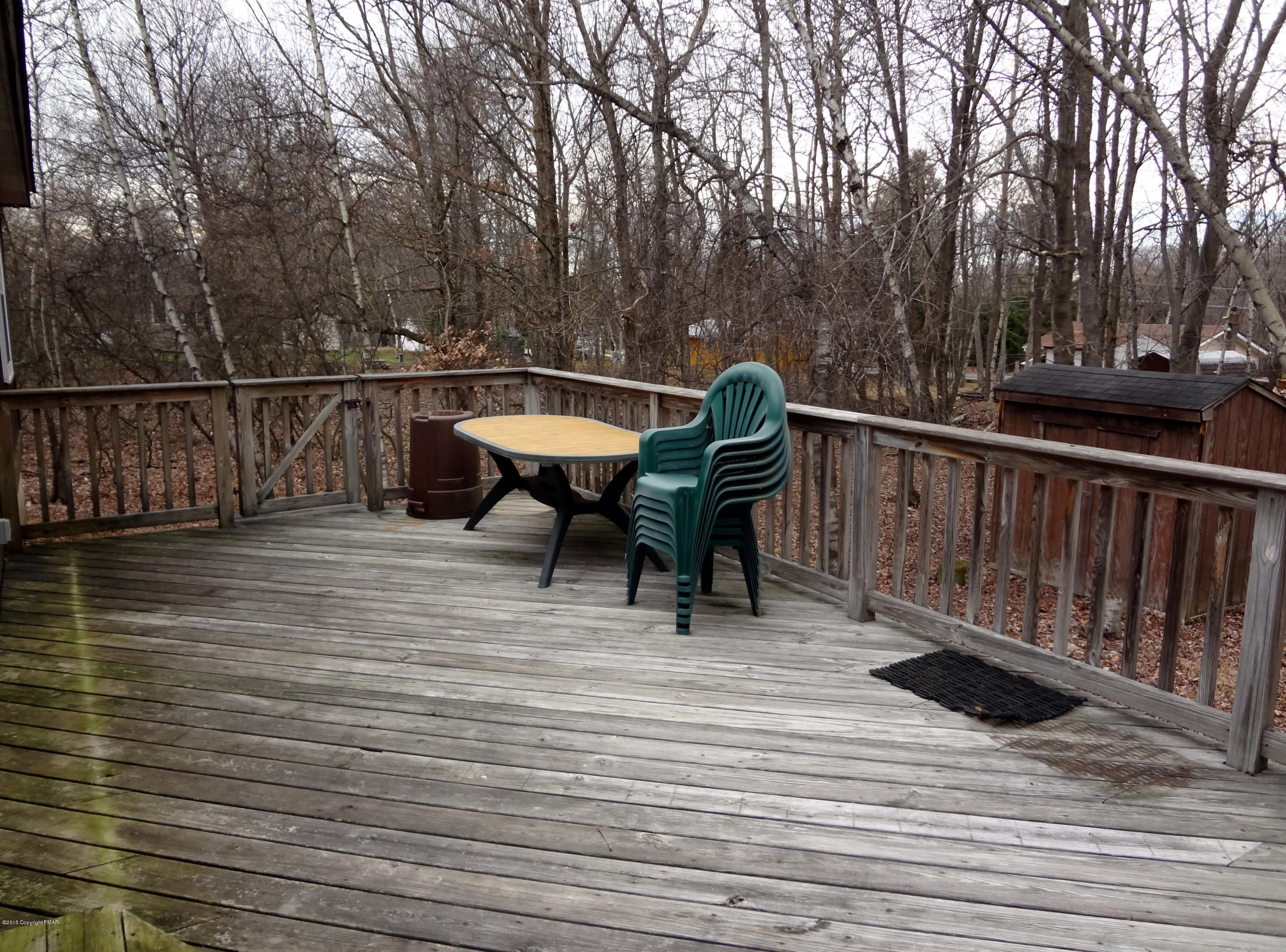 35 Shortridge Road Albrightsville, PA 18210 - Photo 6 of 27 a view of a roof deck with table and chairs and wooden floor