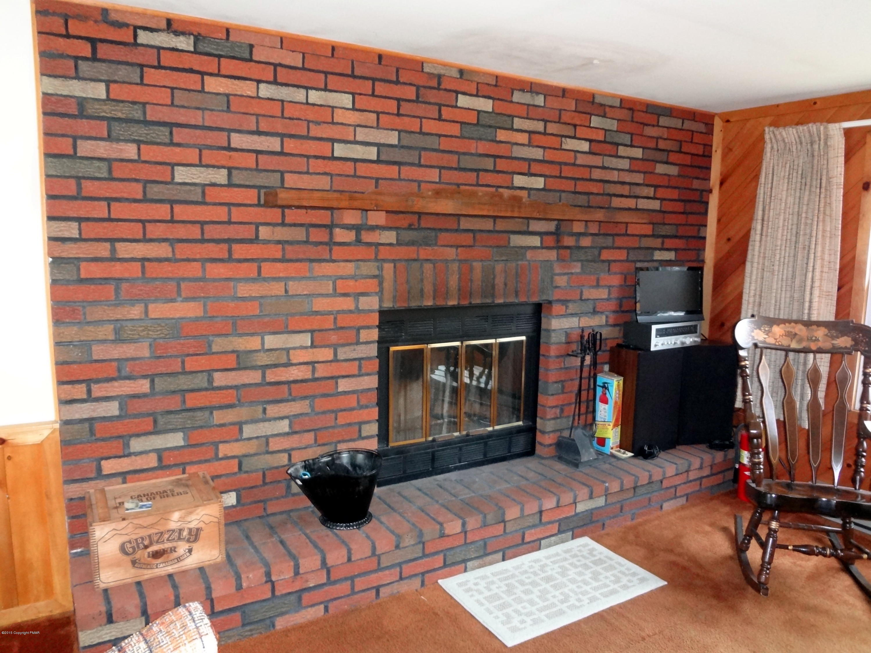 35 Shortridge Road Albrightsville, PA 18210 - Photo 8 of 27 a view of living room with furniture and a fireplace