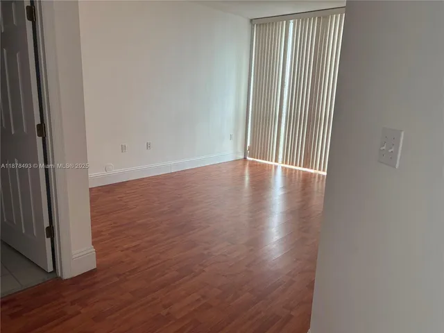 a bathroom with a granite countertop toilet a sink and bathtub