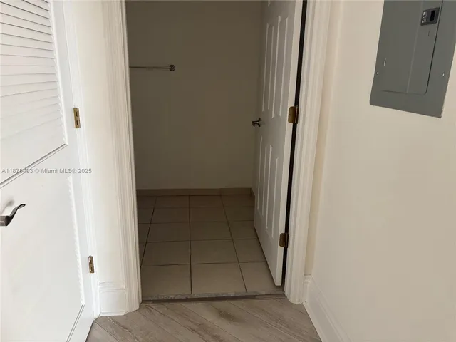 a bathroom with a sink toilet and a mirror
