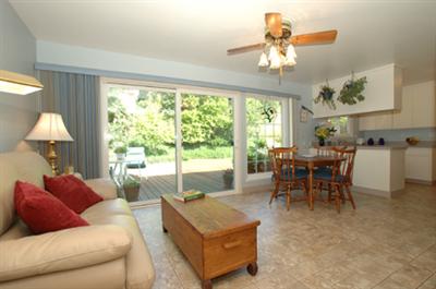 699 McClay Road Novato, CA 94947 - Photo 3 of 10 a living room with furniture and a chandelier