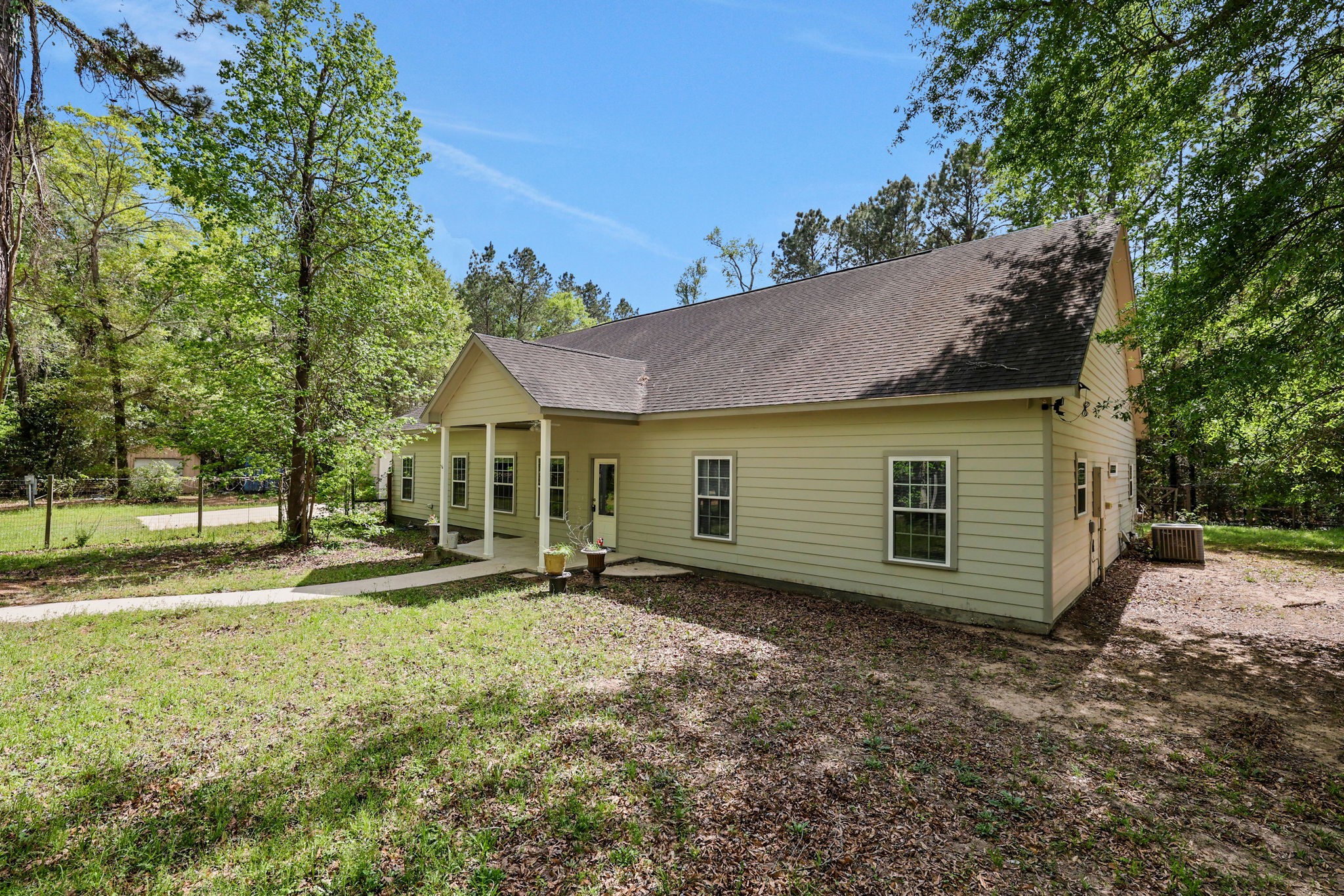 1290 Spring Ridge Road Coldspring, TX 77331 - Photo 1 of 49 Welcome to 1290 Spring Ridge Road in Coldpring, Texas