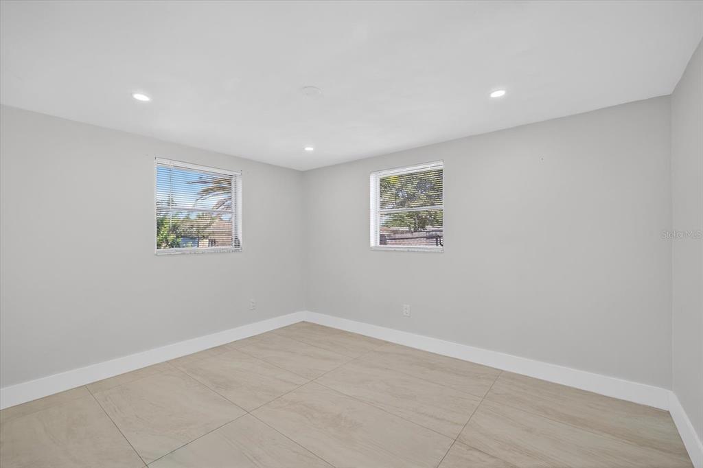 7421 Ashwood Drive Port Richey, FL 34668 - Photo 21 of 47 an empty room with a window