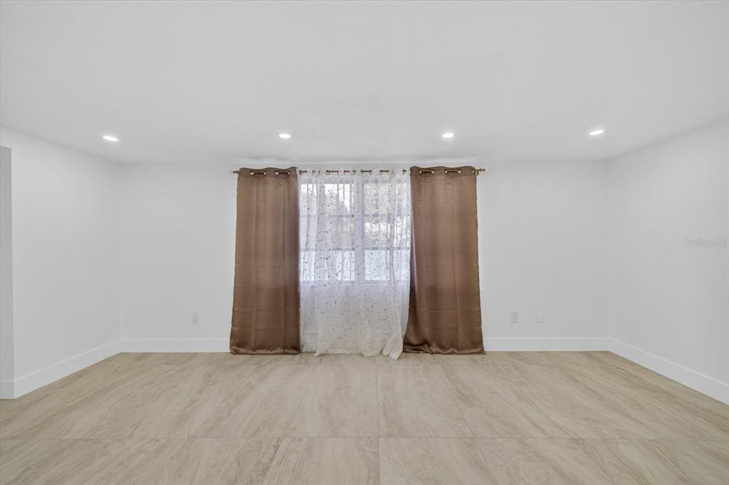 7421 Ashwood Drive Port Richey, FL 34668 - Photo 25 of 47 a view of an empty room