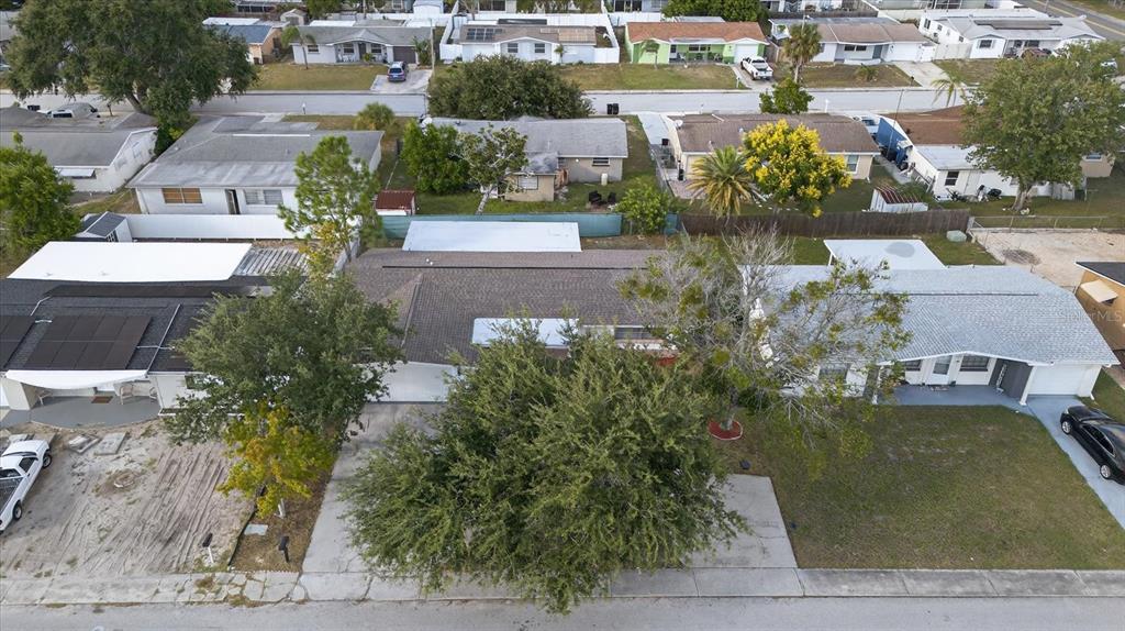 7421 Ashwood Drive Port Richey, FL 34668 - Photo 44 of 47 an aerial view of a houses with yard