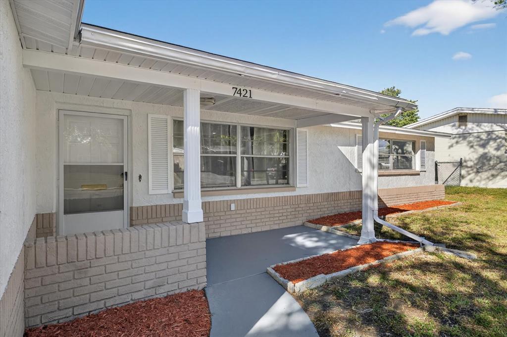 7421 Ashwood Drive Port Richey, FL 34668 - Photo 7 of 47 a front view of a house with shower