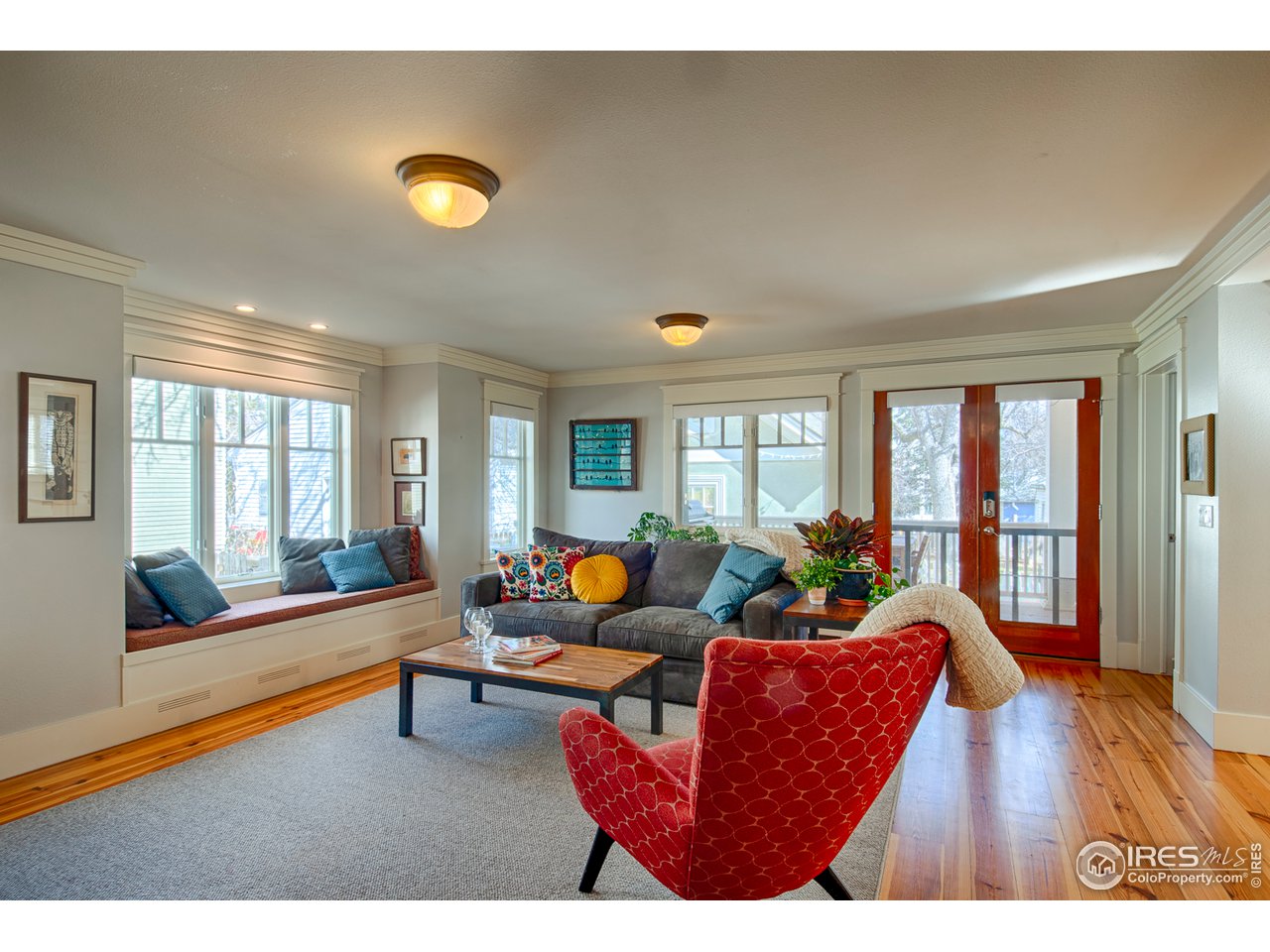 3182 7th Street Boulder, CO 80304 - Photo 11 of 38 a living room with furniture and a large window