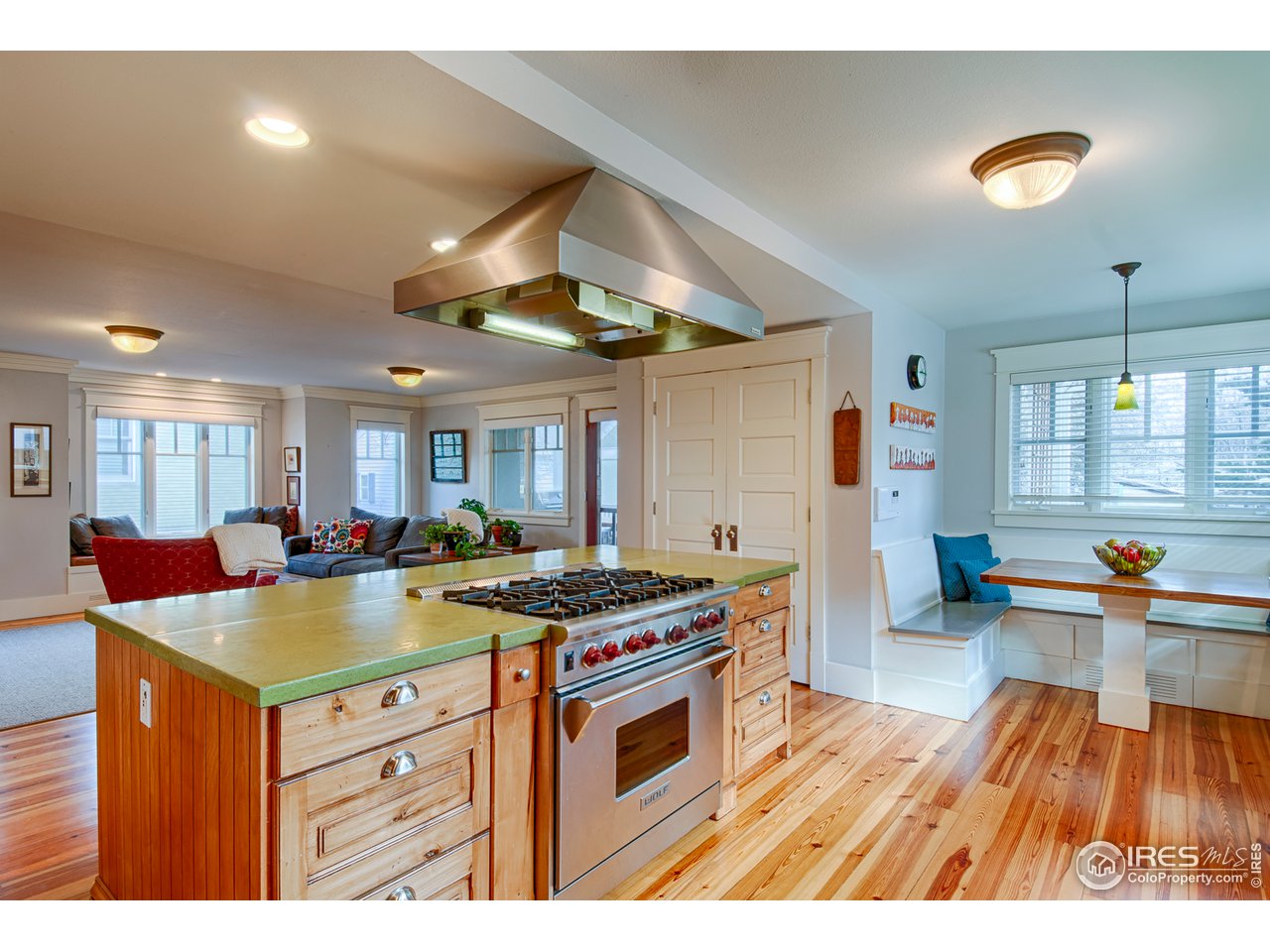 3182 7th Street Boulder, CO 80304 - Photo 13 of 38 a kitchen that has a stove and a wooden floor
