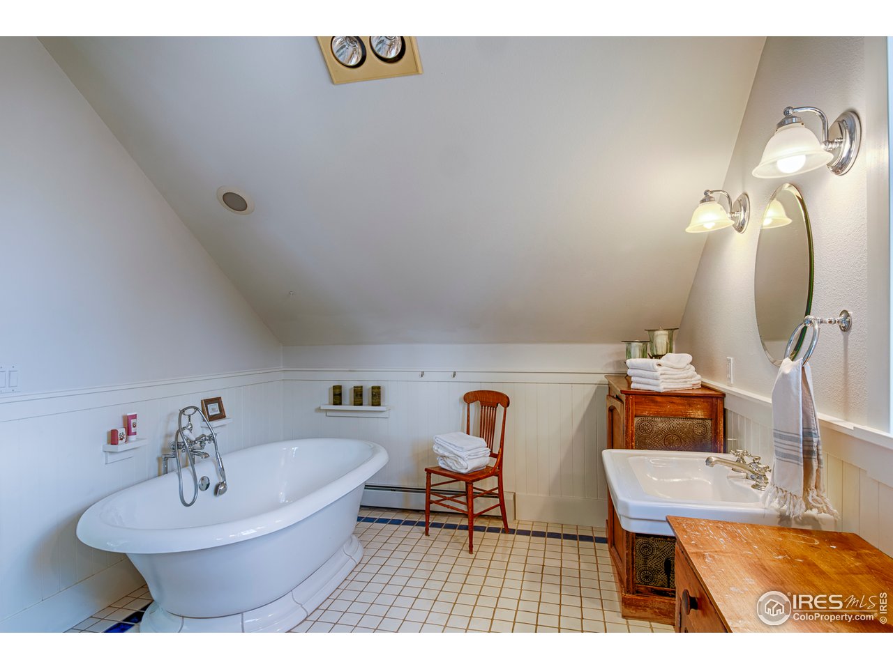 3182 7th Street Boulder, CO 80304 - Photo 22 of 38 a living room with furniture and a mirror