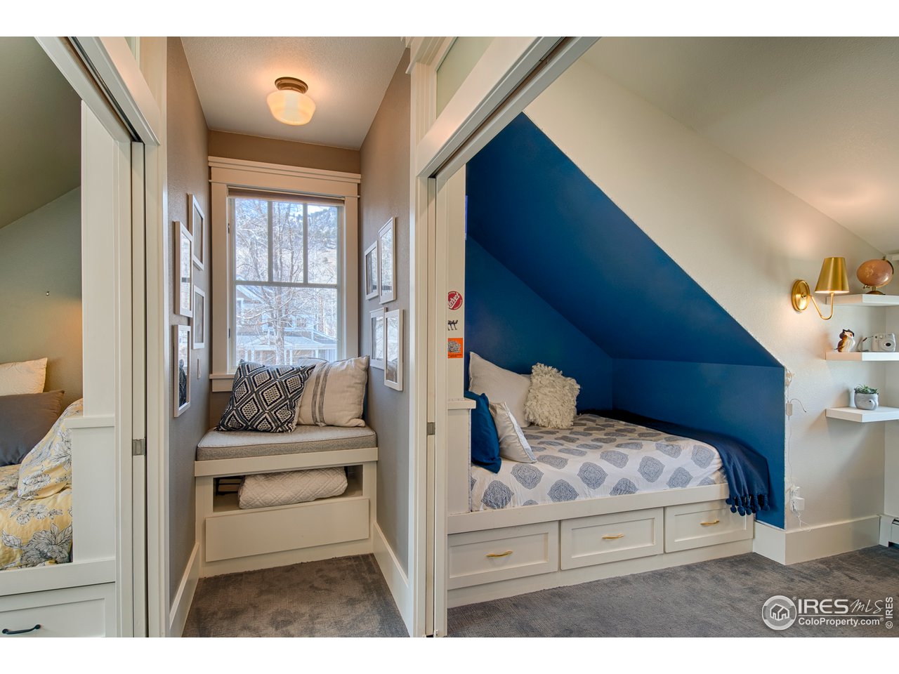 3182 7th Street Boulder, CO 80304 - Photo 26 of 38 a living room with furniture and a fireplace