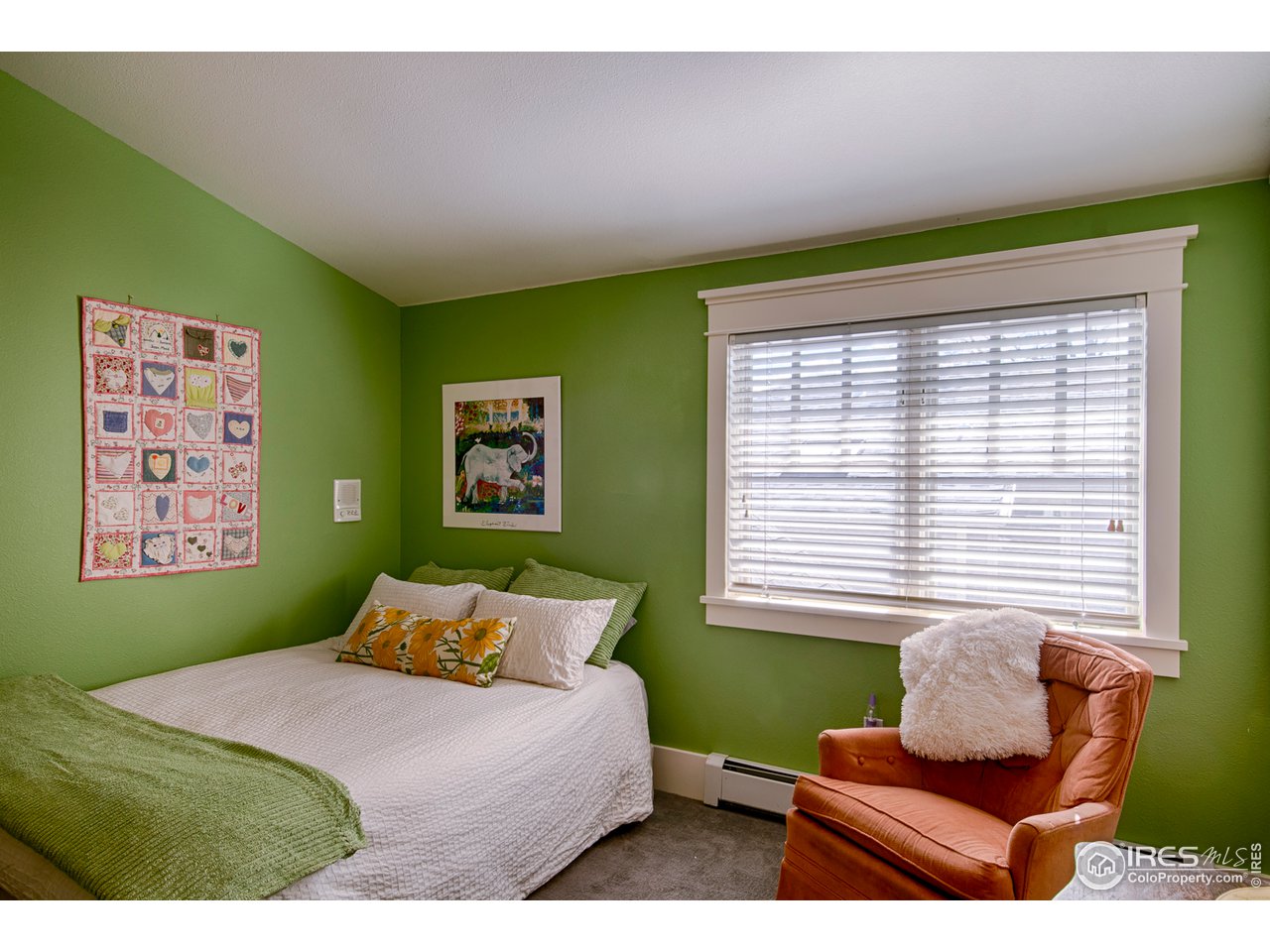 3182 7th Street Boulder, CO 80304 - Photo 30 of 38 a bedroom with a bed and windows