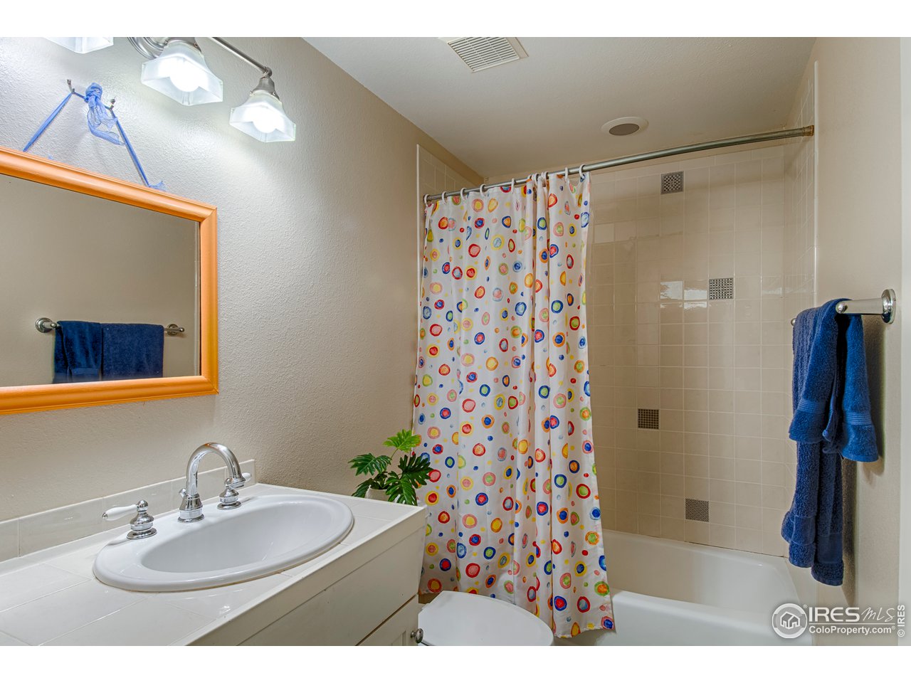 3182 7th Street Boulder, CO 80304 - Photo 33 of 38 a bathroom with a sink toilet and shower