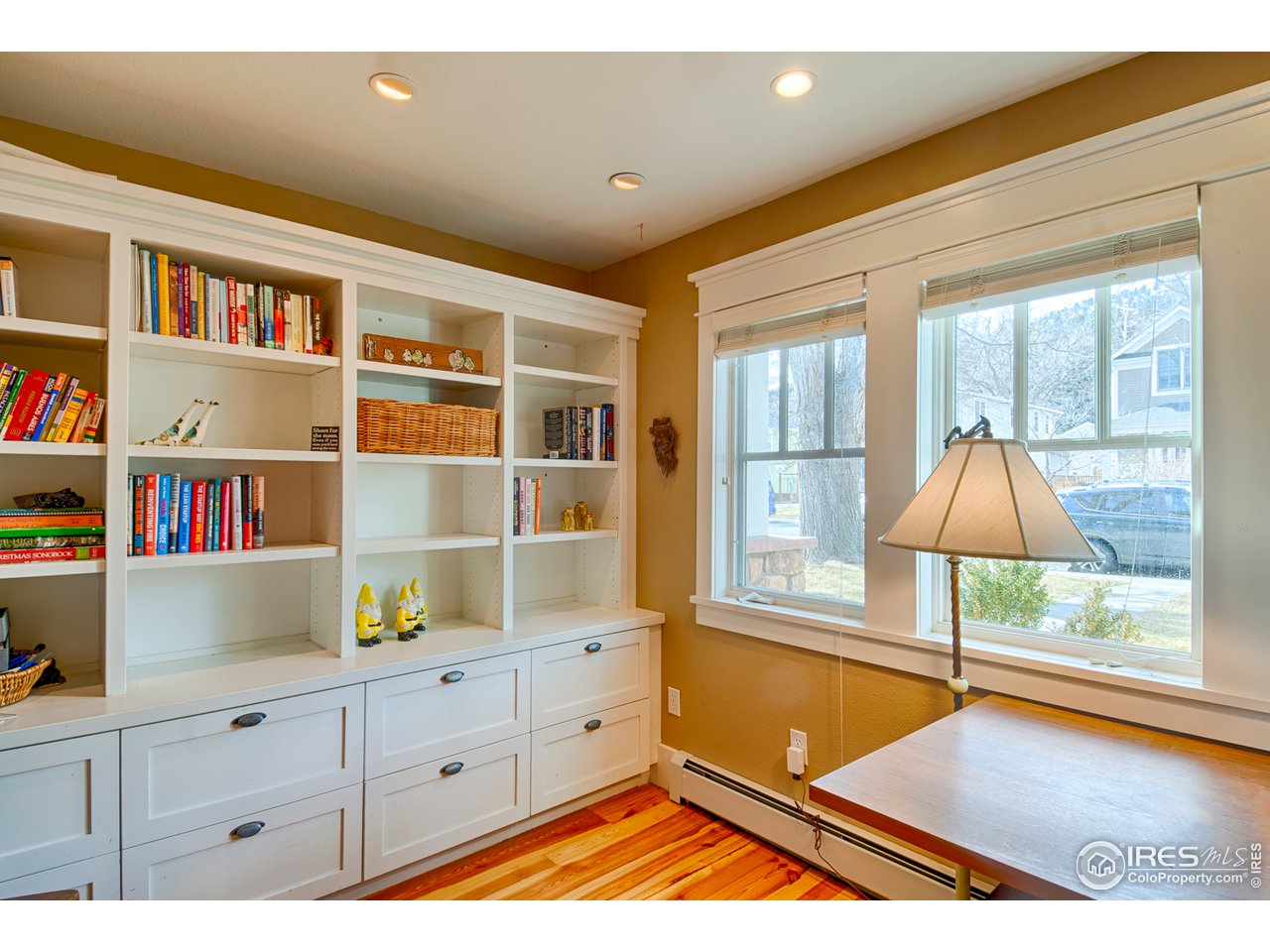 3182 7th Street Boulder, CO 80304 - Photo 6 of 38 a room with cabinets and book shelf
