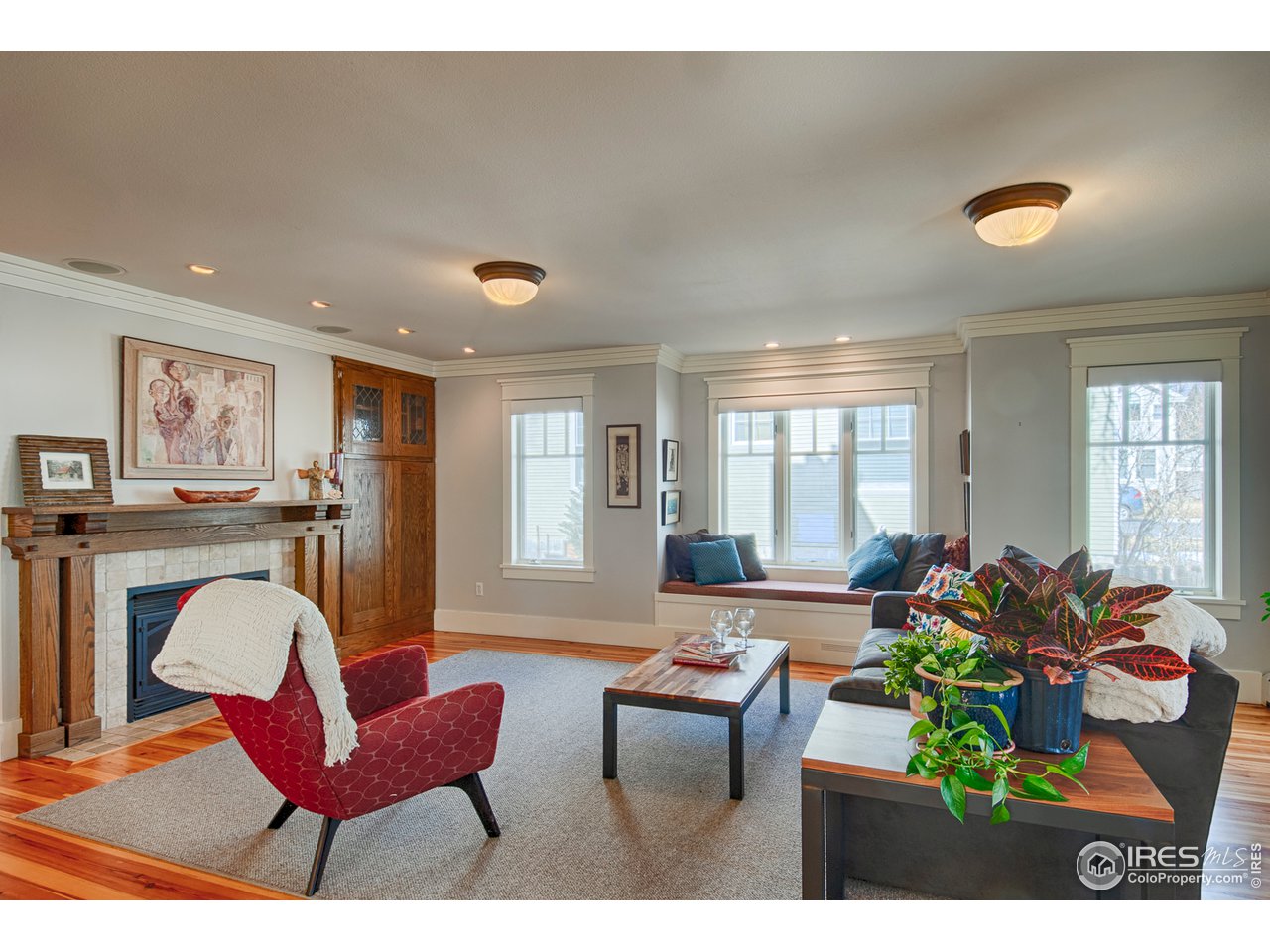 3182 7th Street Boulder, CO 80304 - Photo 10 of 38 a living room with furniture a window and a potted plant
