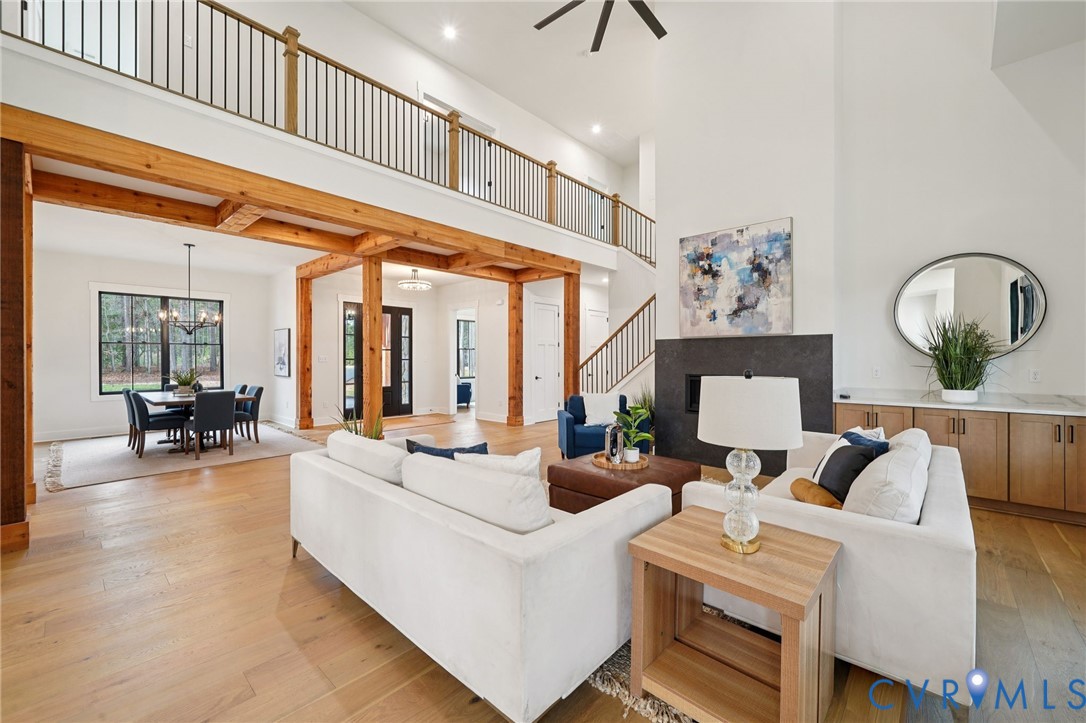 1165 Cardinal Crest Terrace Midlothian, VA 23113 - Photo 12 of 50 a living room with fireplace furniture and a large window