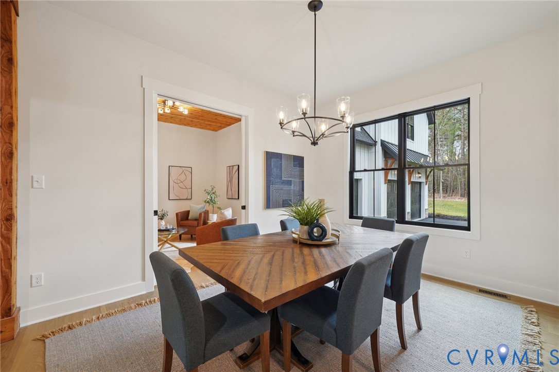 1165 Cardinal Crest Terrace Midlothian, VA 23113 - Photo 14 of 50 a view of a dining room with furniture window and outside view