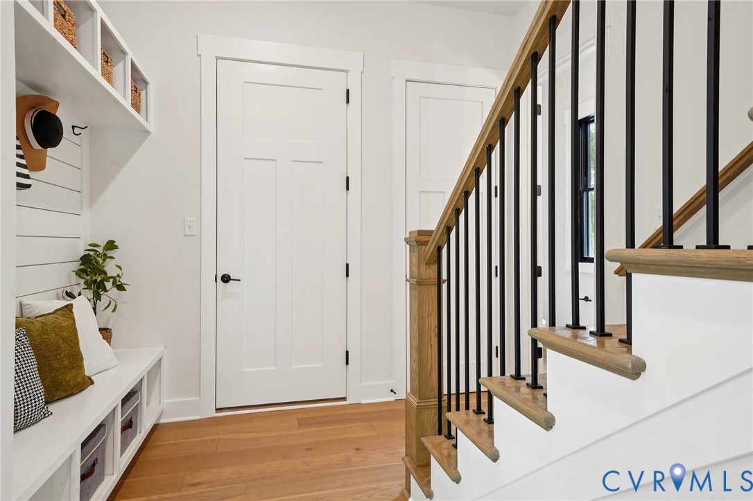 1165 Cardinal Crest Terrace Midlothian, VA 23113 - Photo 25 of 50 a view of a hallway with wooden floor and staircase