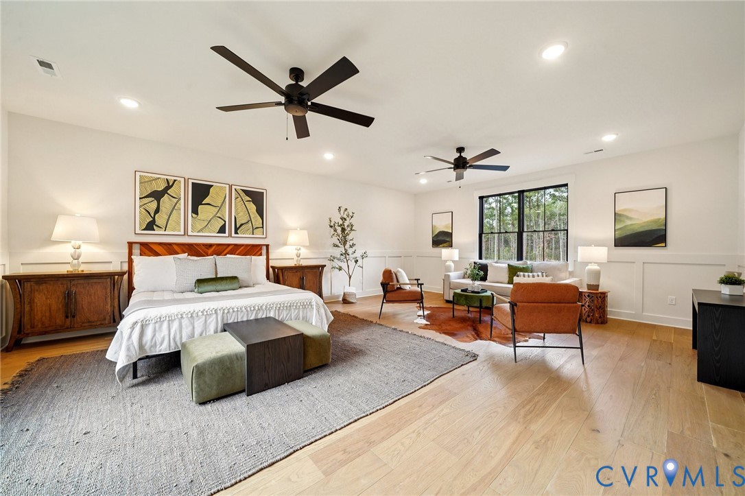 1165 Cardinal Crest Terrace Midlothian, VA 23113 - Photo 27 of 50 a bedroom with a large bed and a couch