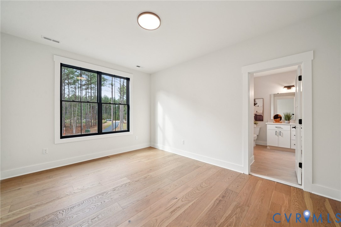 1165 Cardinal Crest Terrace Midlothian, VA 23113 - Photo 33 of 50 an empty room with wooden floor and windows
