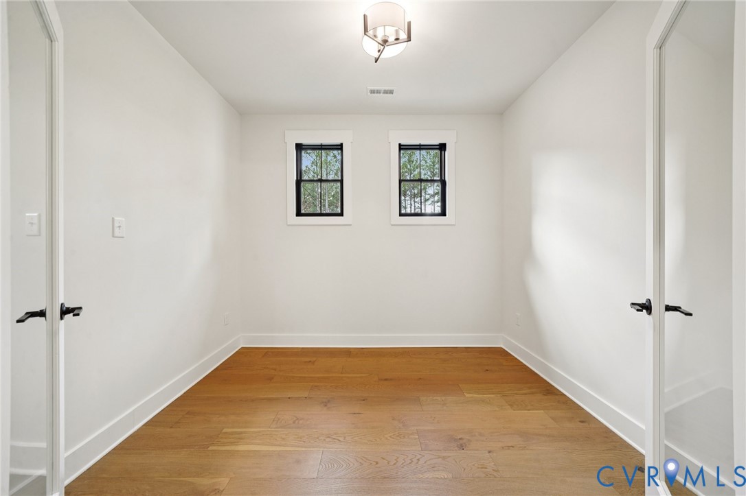 1165 Cardinal Crest Terrace Midlothian, VA 23113 - Photo 37 of 50 wooden floor in an empty room