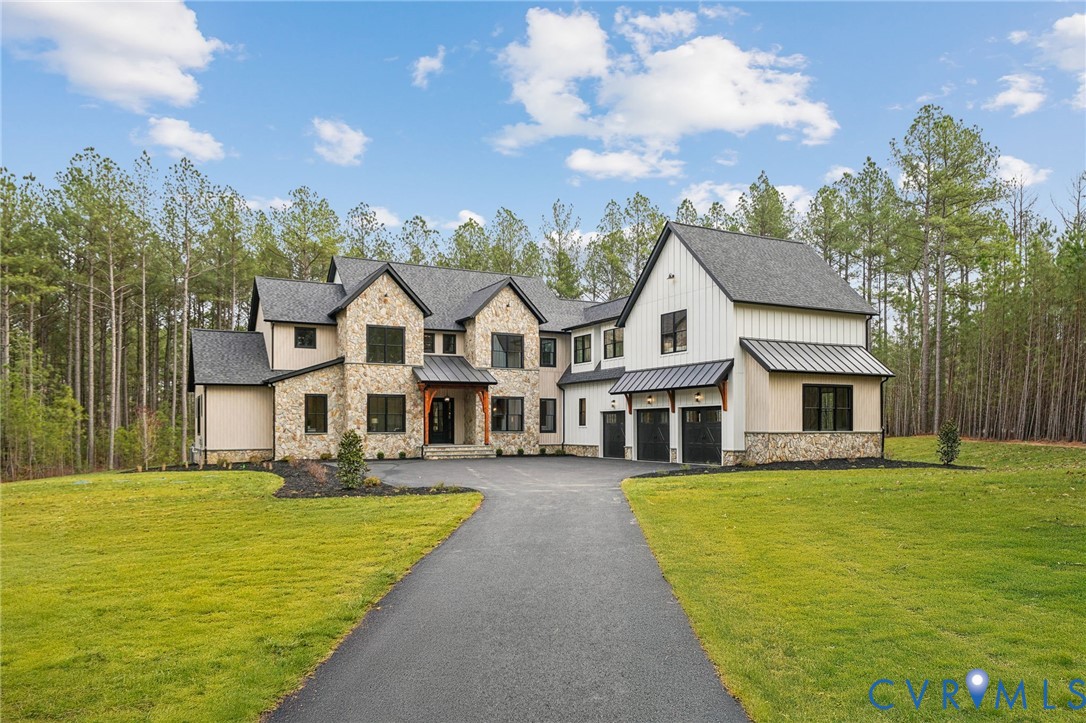 1165 Cardinal Crest Terrace Midlothian, VA 23113 - Photo 46 of 50 a view of a white house with a big yard and potted plants