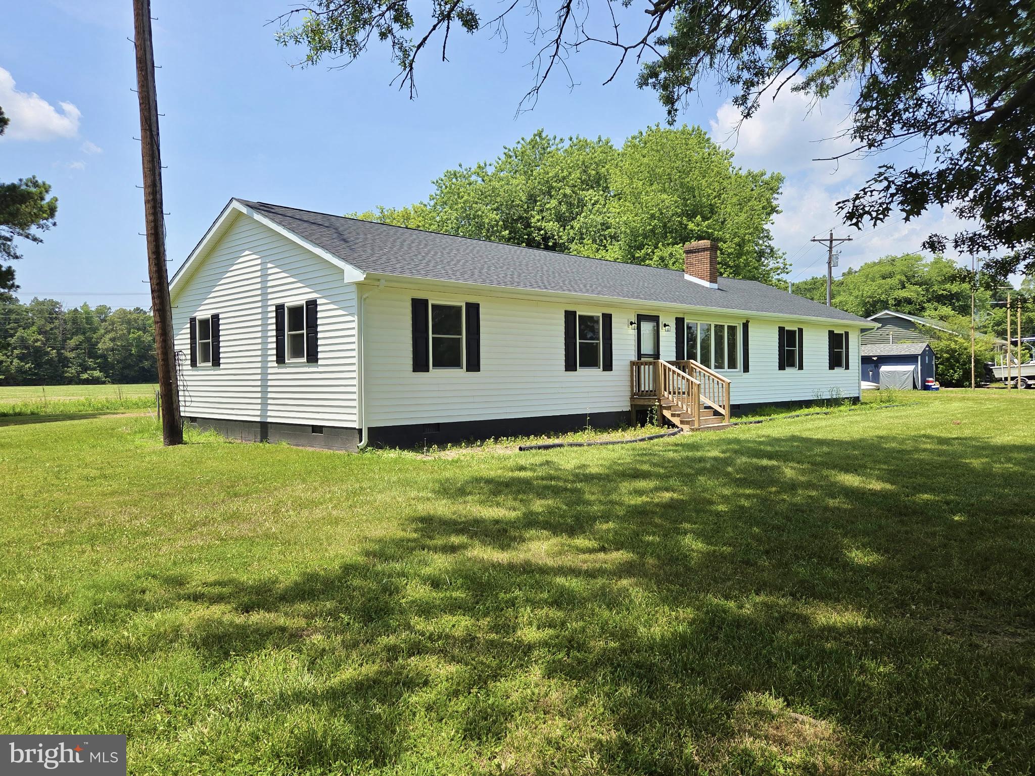 5046 Aireys Road Cambridge, MD 21613 - Photo 1 of 35 a house view with a garden space