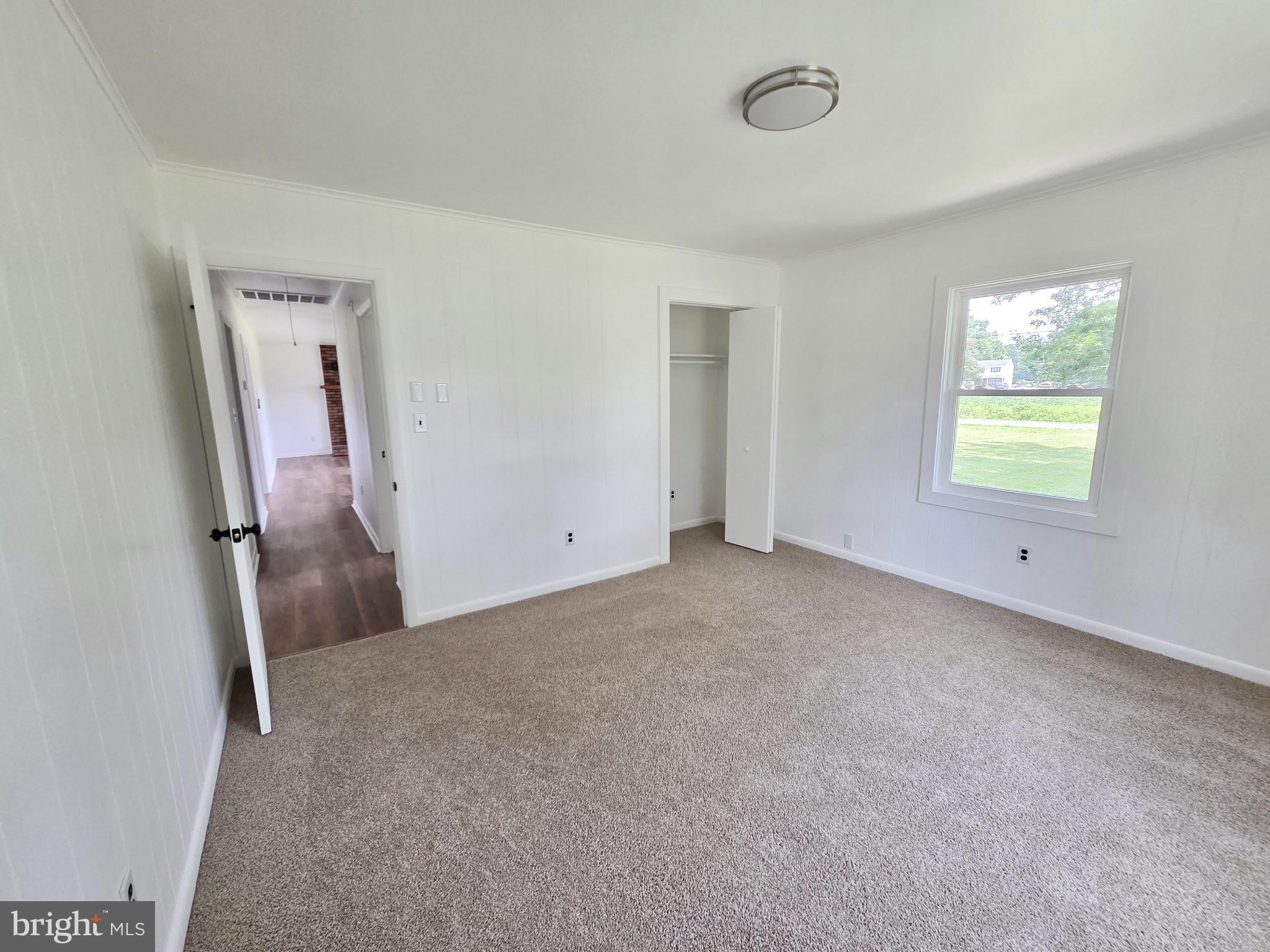 5046 Aireys Road Cambridge, MD 21613 - Photo 25 of 35 a view of an empty room and a window