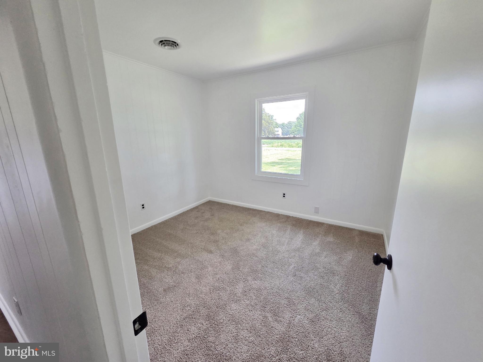 5046 Aireys Road Cambridge, MD 21613 - Photo 30 of 35 a view of a room that has a window in it