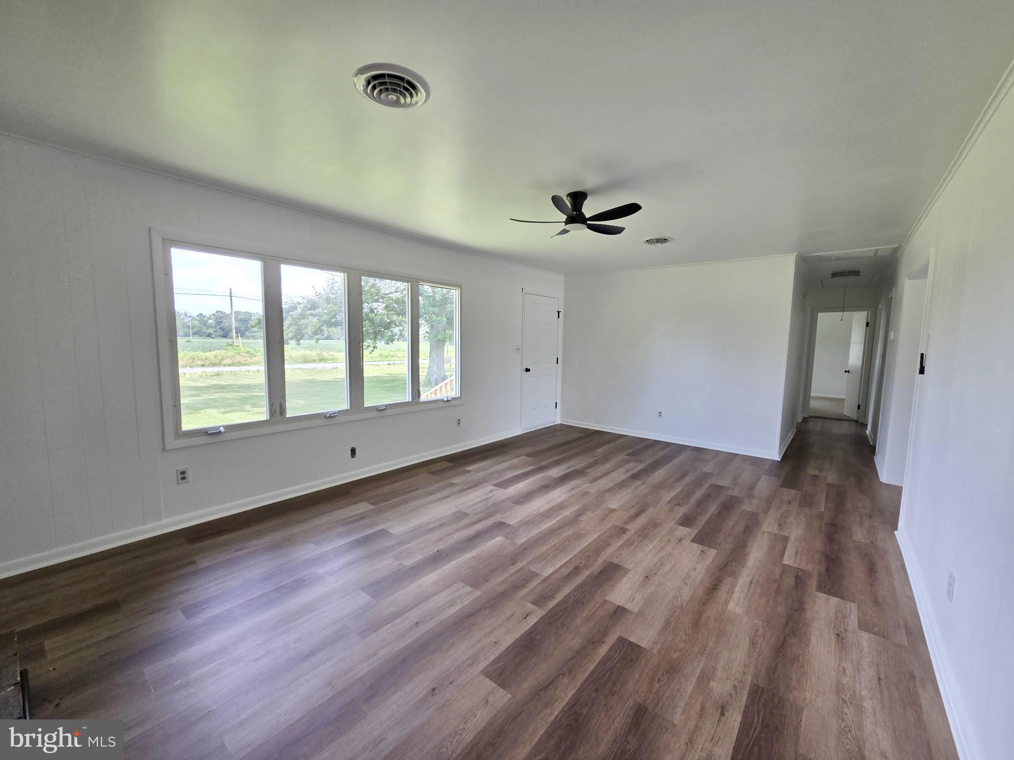5046 Aireys Road Cambridge, MD 21613 - Photo 31 of 35 a view of an empty room with a window