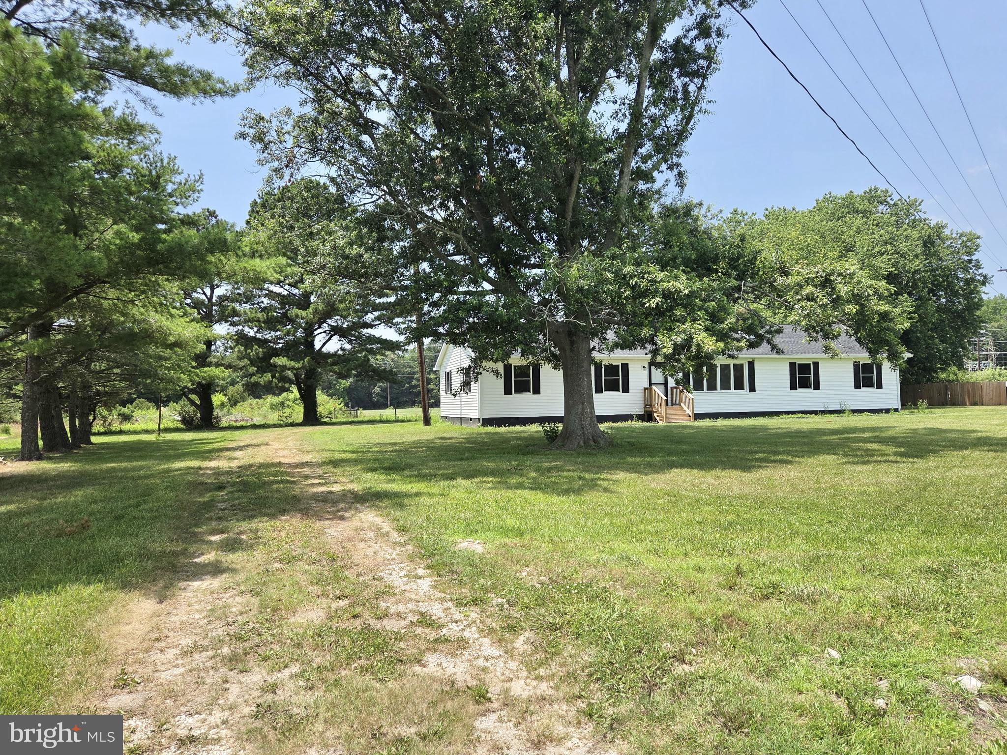 5046 Aireys Road Cambridge, MD 21613 - Photo 6 of 35 a view of a house with a big yard