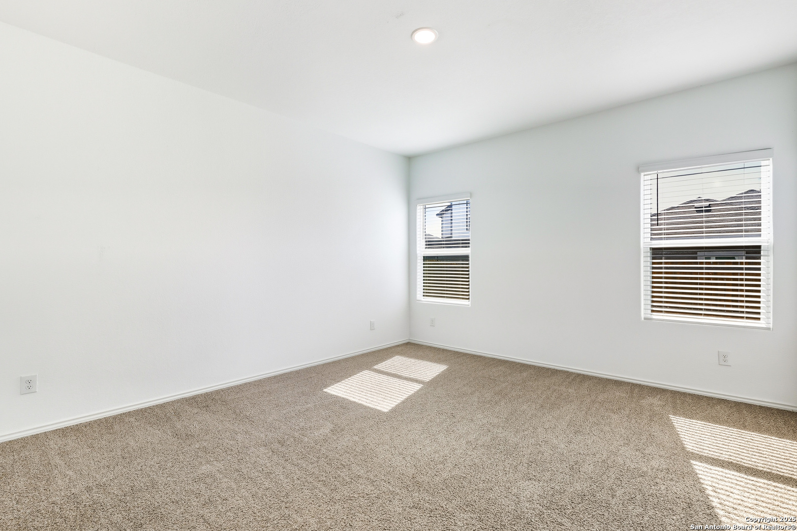 4426 Chandler Road, Unit 3 San Antonio, TX 78222 - Photo 13 of 26 an empty room with windows