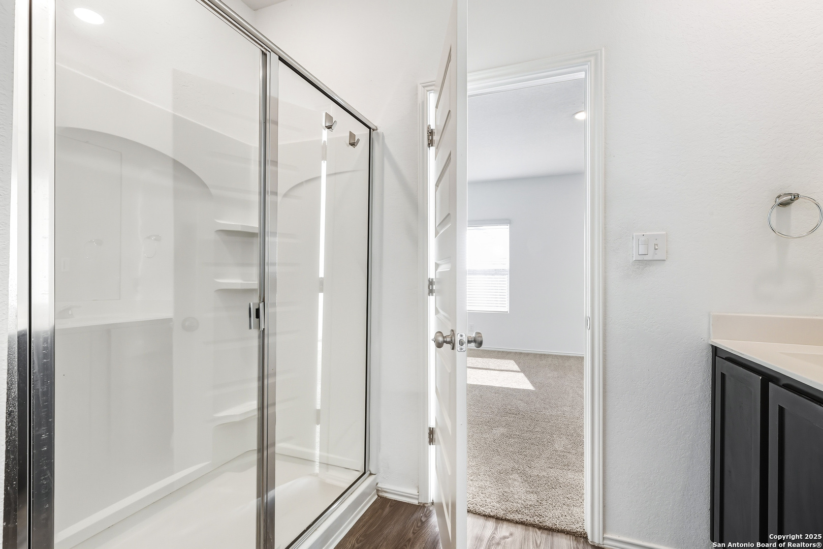 4426 Chandler Road, Unit 3 San Antonio, TX 78222 - Photo 16 of 26 a bathroom with a glass shower door