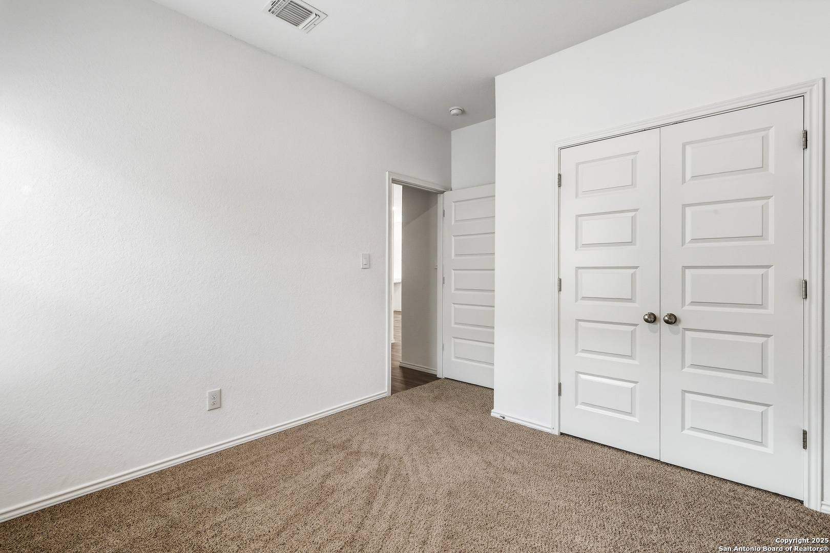 4426 Chandler Road, Unit 3 San Antonio, TX 78222 - Photo 21 of 26 an empty room with closet area