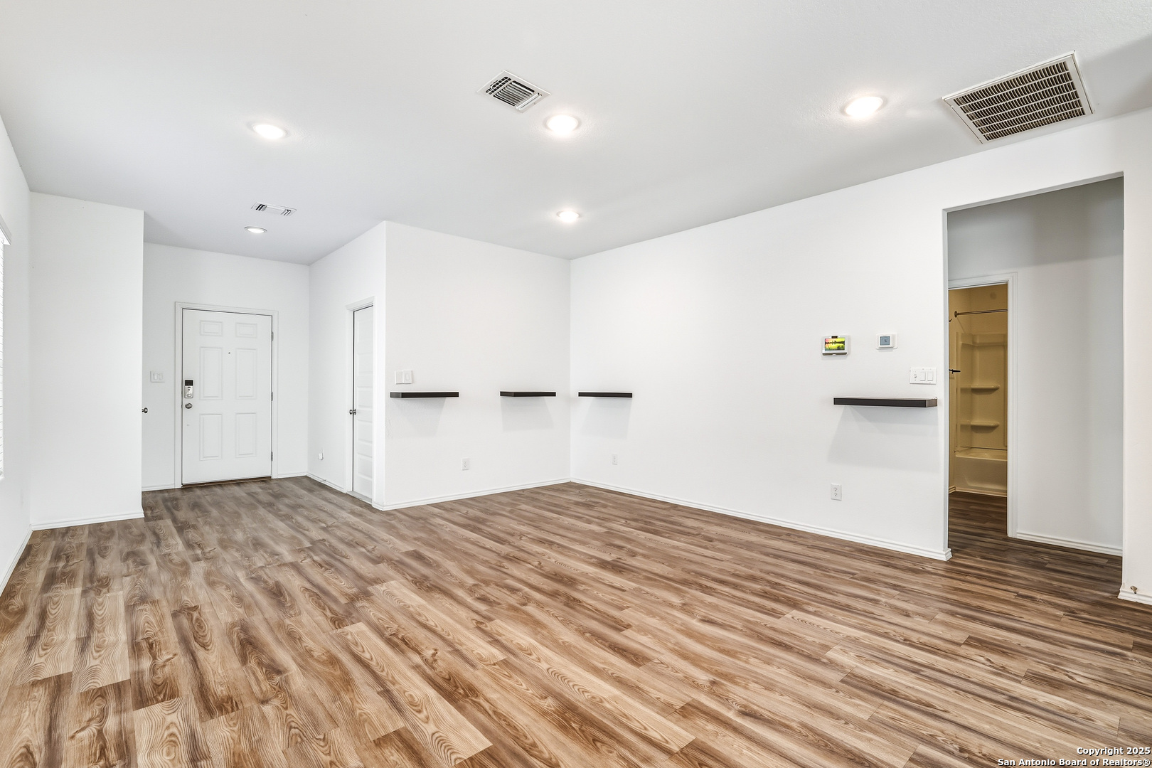 4426 Chandler Road, Unit 3 San Antonio, TX 78222 - Photo 3 of 26 a view of empty room with wooden floor