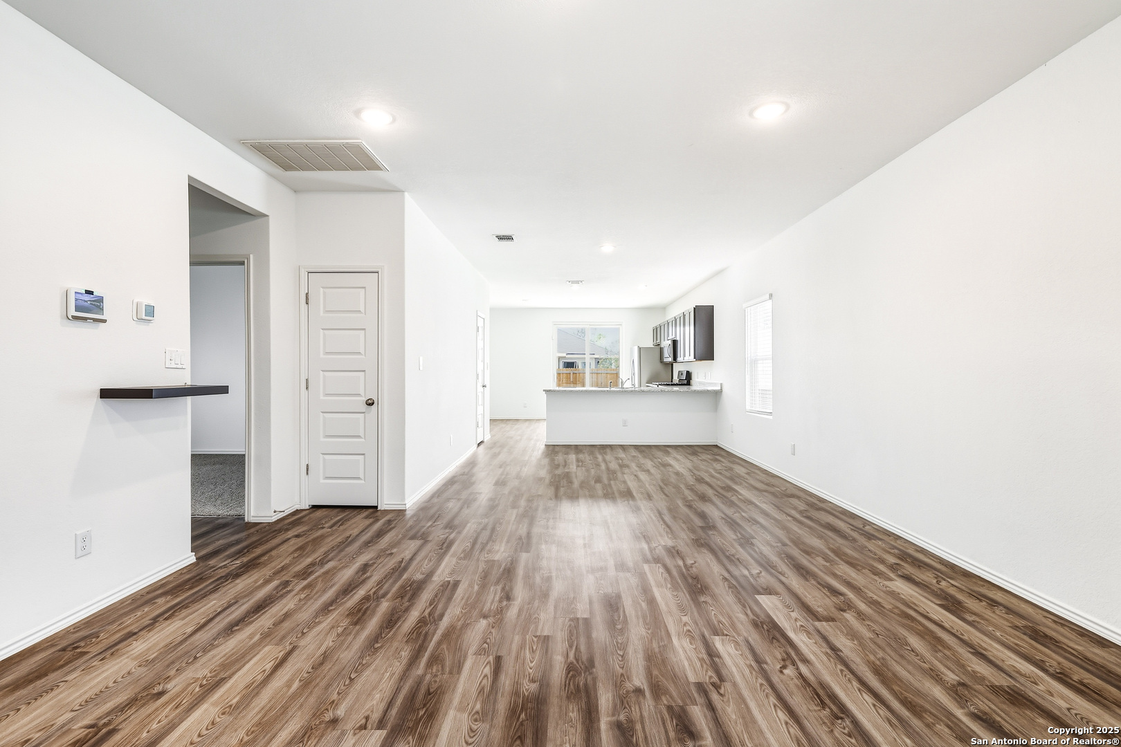 4426 Chandler Road, Unit 3 San Antonio, TX 78222 - Photo 5 of 26 a view of empty room with wooden floor