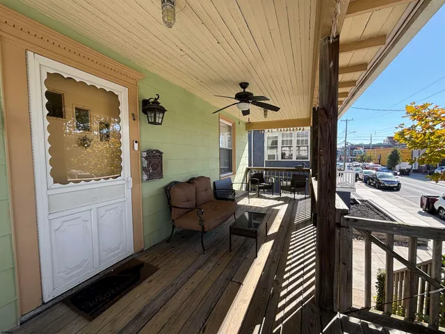 a view of a livingroom with furniture and window
