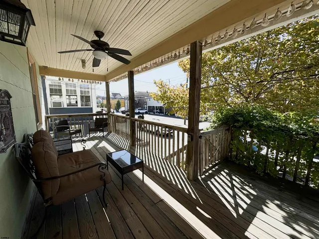 a view of a living room and balcony