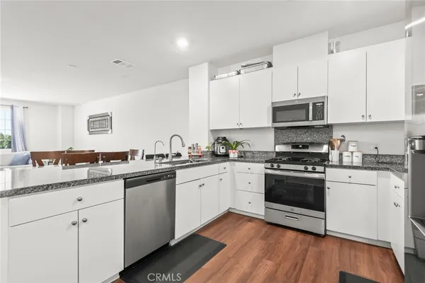 a bedroom with a bed and a cabinets