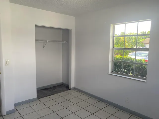 an empty room with windows