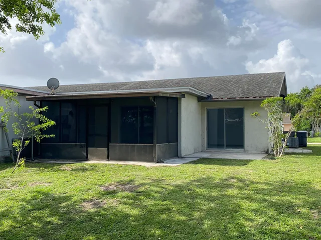 a house view with a garden space