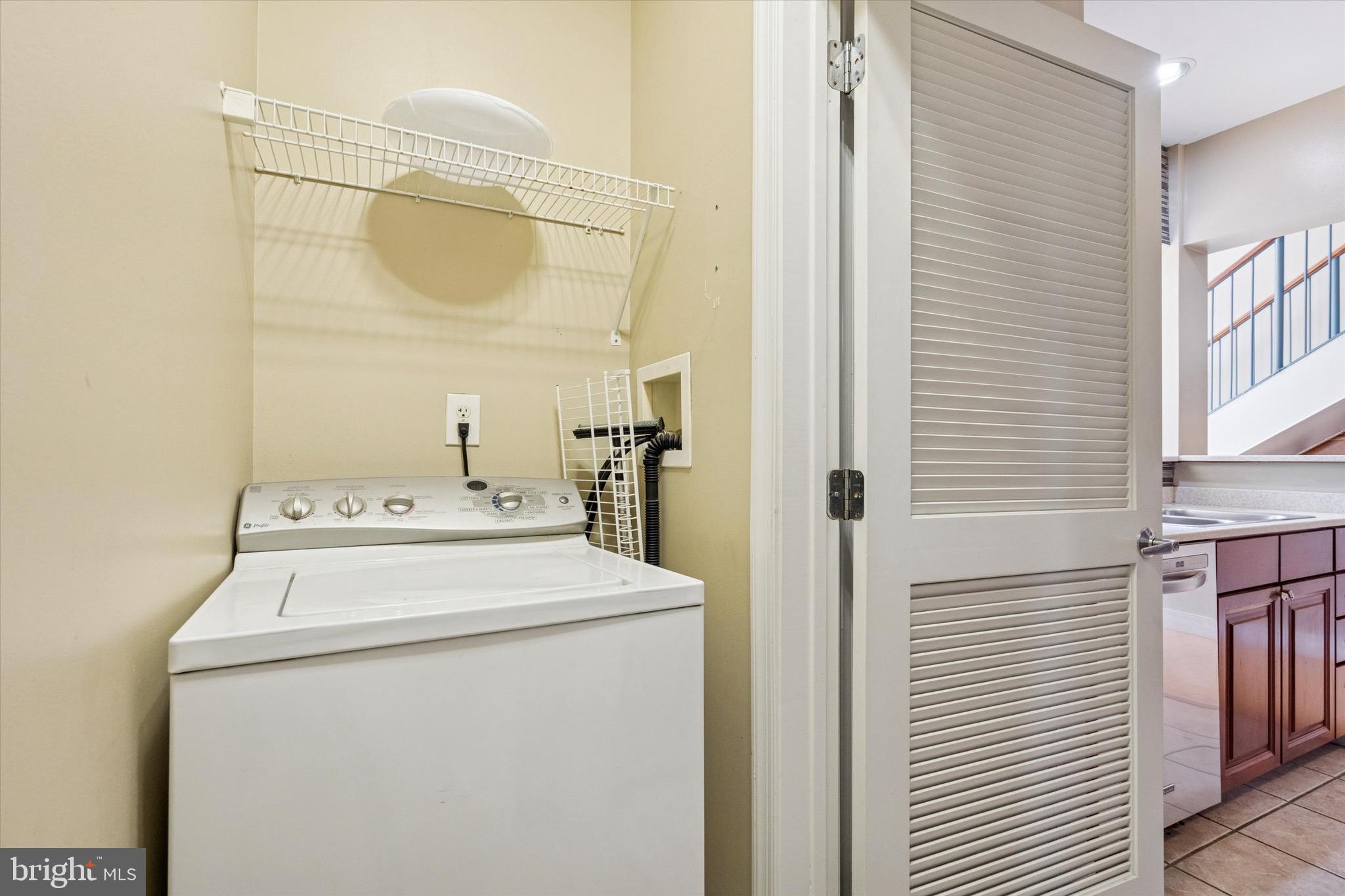 1600 Arch Street, Unit 2008 Philadelphia, PA 19103 - Photo 19 of 25 a utility room with dryer and washer